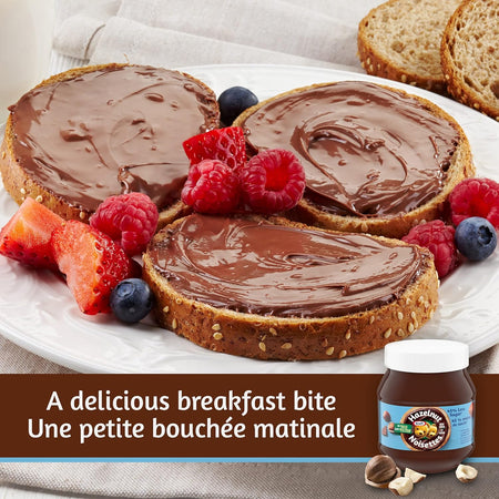 Three slices of bread with Nutella spread, topped with berries, on a plate with a jar of Nutella in the corner.