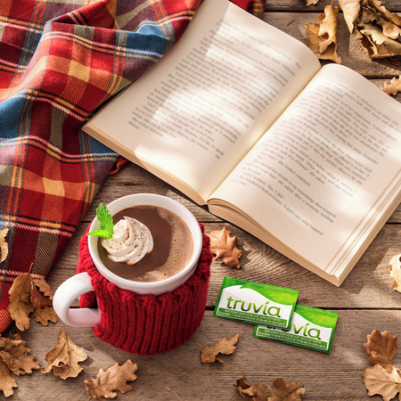 Truvia Calorie-Free Stevia Sweetener Packets And A Coffee Mug