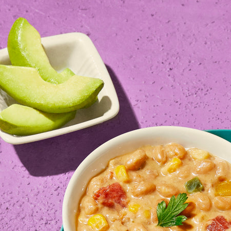 Sprague Cannery Plant-Based White Bean Chili, Ready to Eat, 425g/15 oz., Can, chili in a bowl.