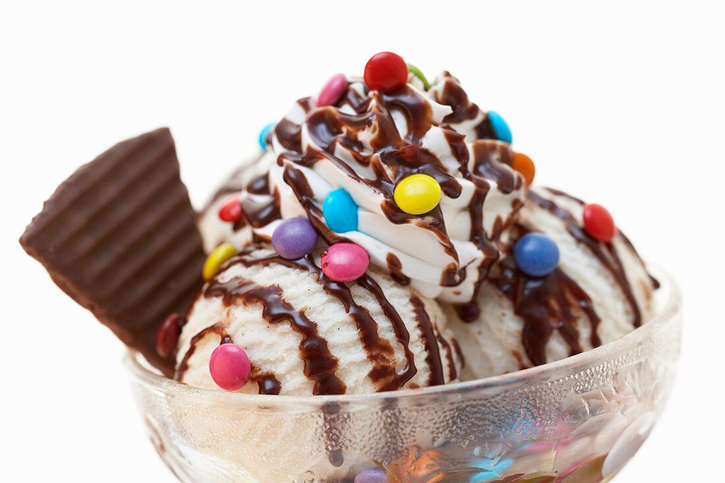 Ice cream topped off with Nestle Smarties Chocolates