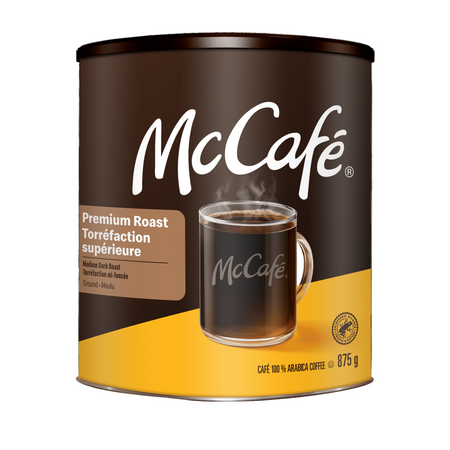 McCafé coffee can 875g with a glass of coffee on a green background