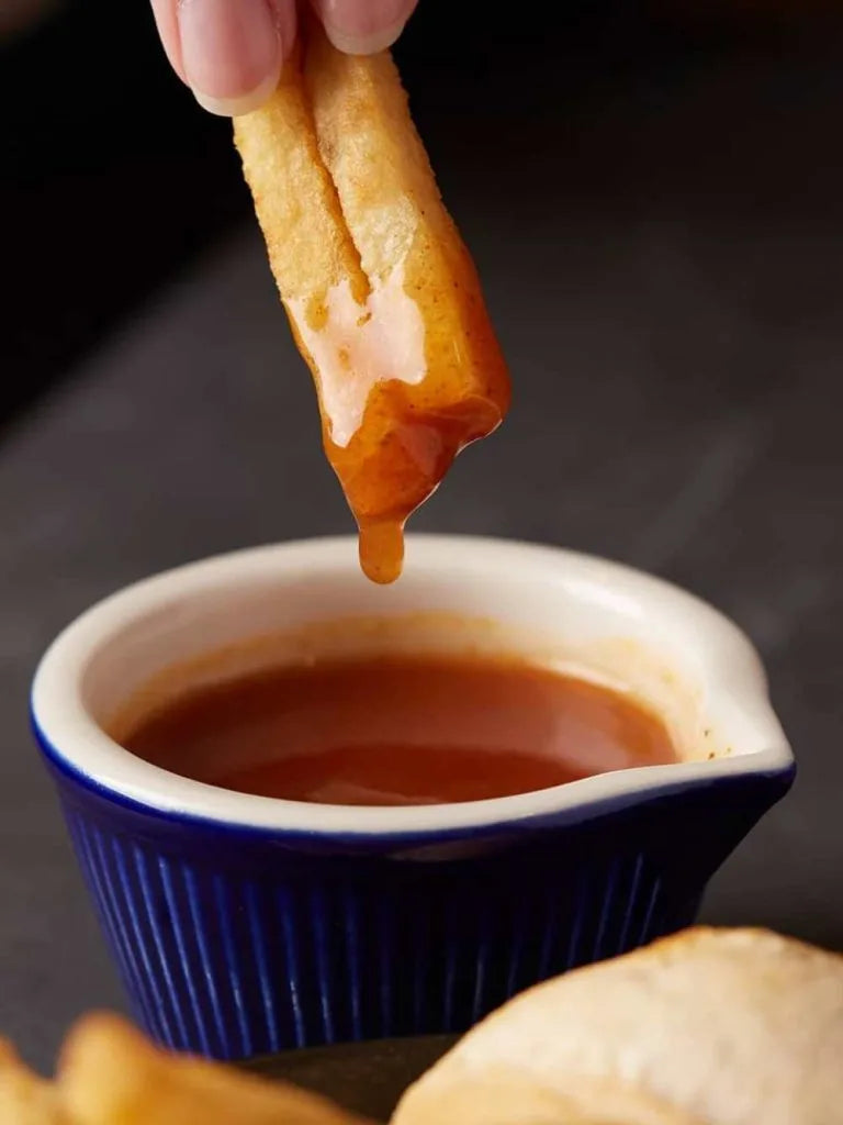 Swiss Chalet Dipping Sauce, 284ml, dipping sauce in a cup.