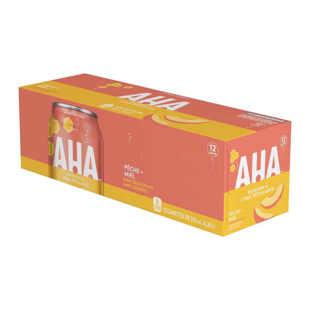 Box of AHA peach honey sparkling water cans on a white background
