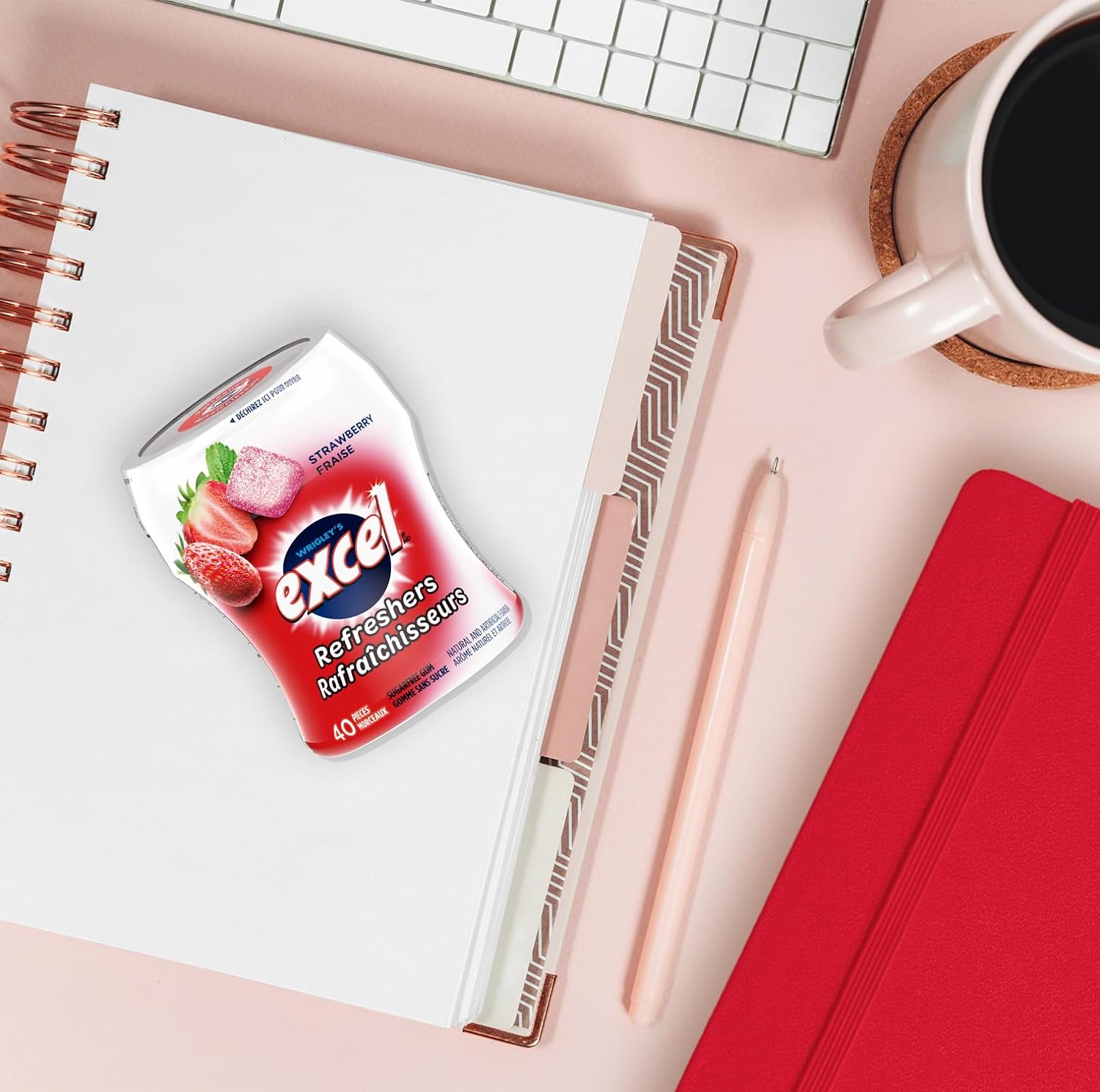 Excel Sugar-Free Gum, Refreshers Strawberry, 6 ct. Package, one bottle on office desk.
