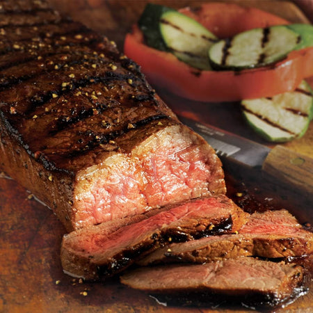 Club House La Grille Teriyaki Marinade 350ml, picture of prepared meat with teriyaki marinade.