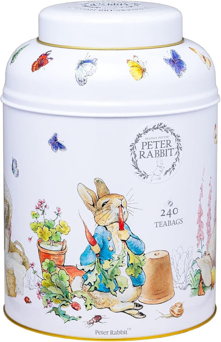 New English Teas Beatrix Potter Peter Rabbit Tea Caddy - 240 Tea Bags - Front of tea canister with Peter Rabbit design featuring a rabbit character and illustrations.