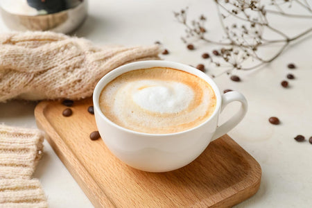 Mokate Gold Premium Caramel Flavored Latte, 10 x 14g Single Serve Sachets, 140g/4.9 oz., a cup of cappuccino.