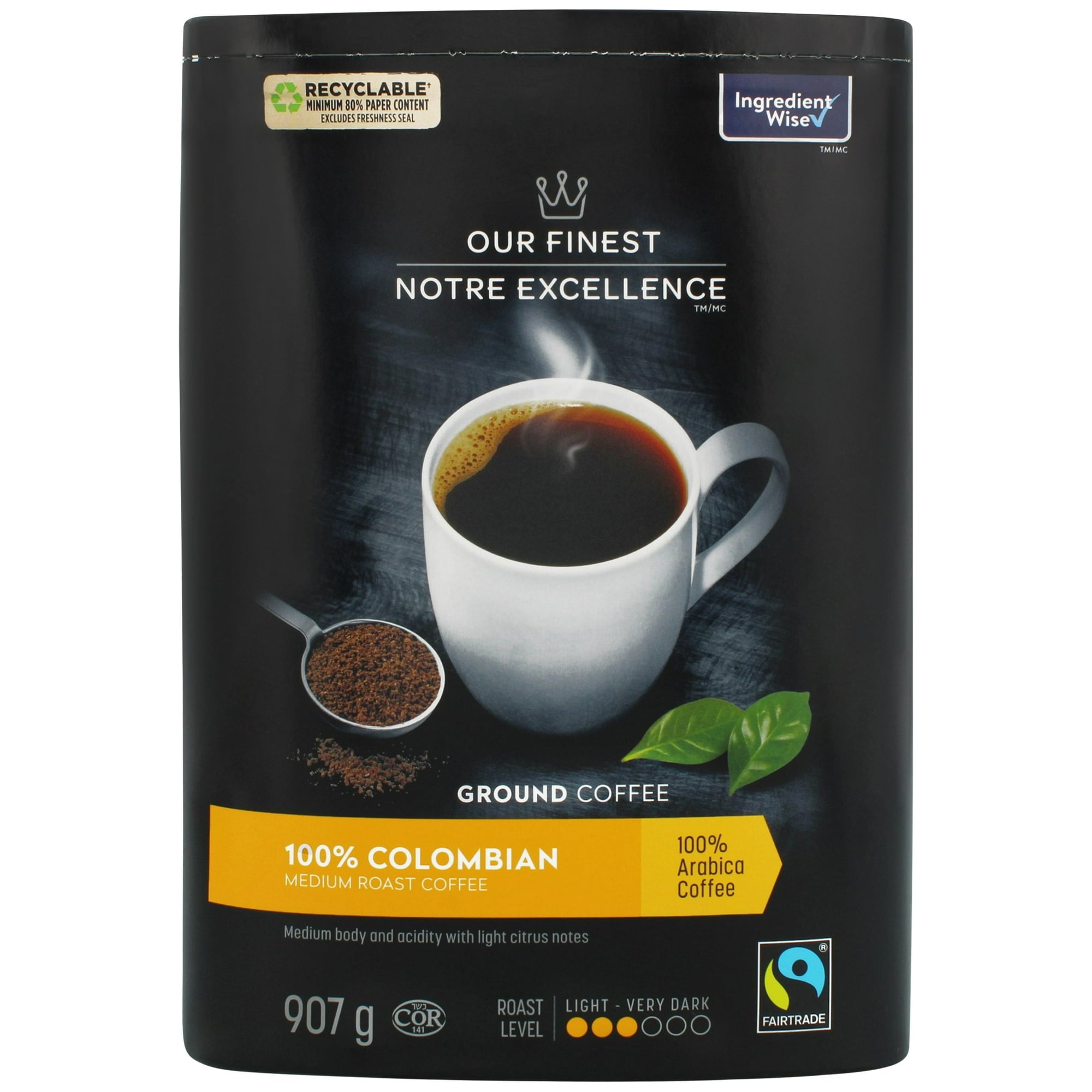 Our Finest 100% Colombian Medium Roast Ground Coffee - 907g package with a cup of coffee and coffee grounds on a dark background