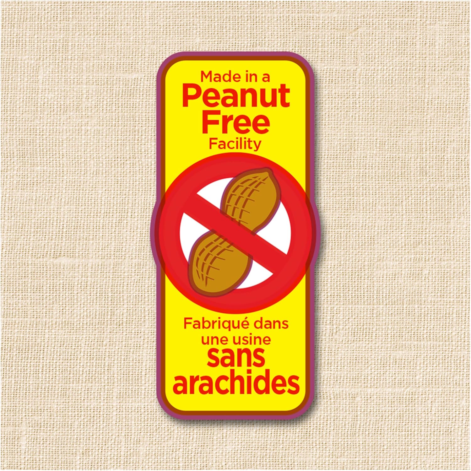 Peanut-free facility sign with a red prohibition symbol on a beige background