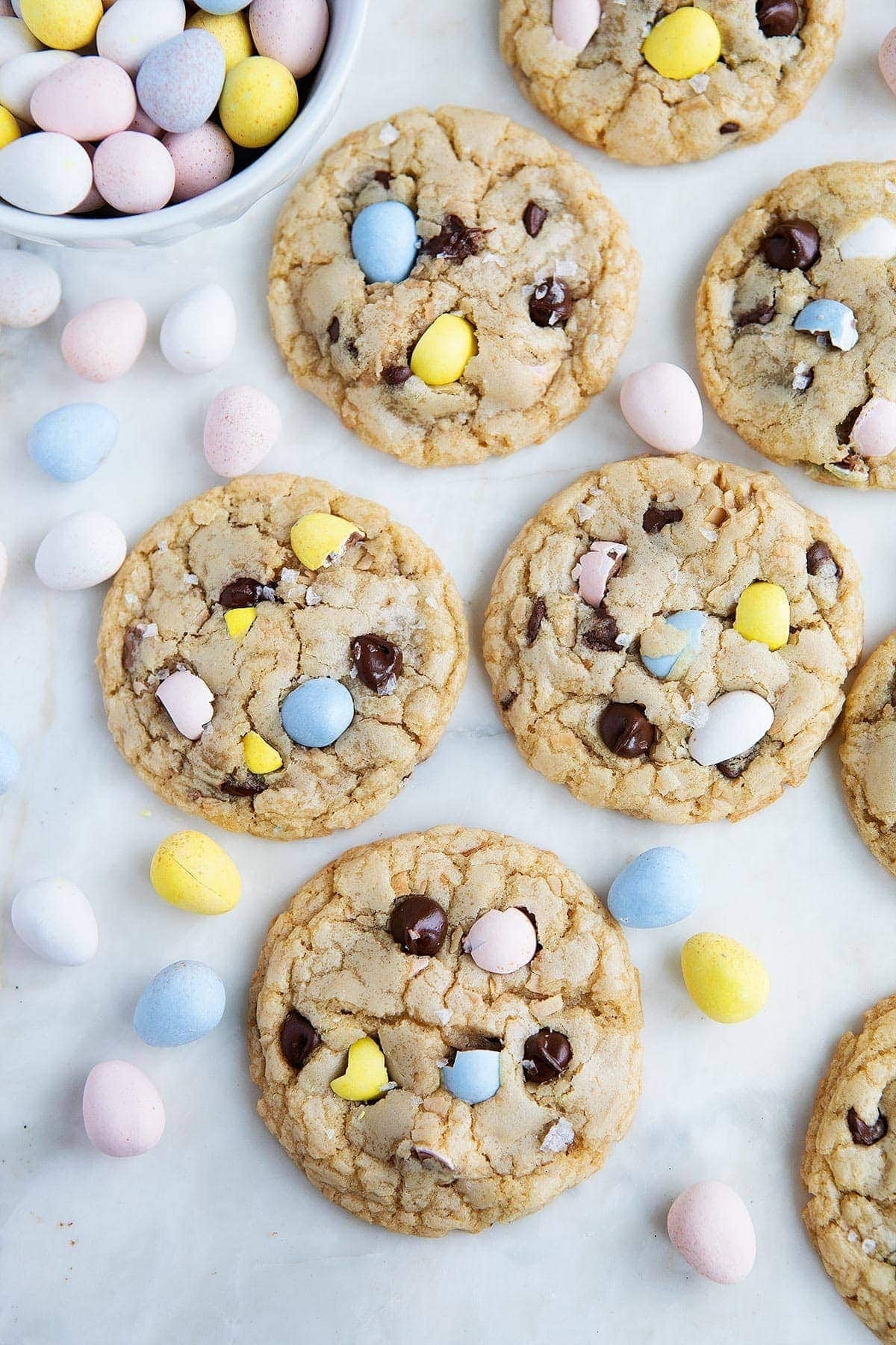 Cookies with chocolate chips and Easter candy on a marble surface