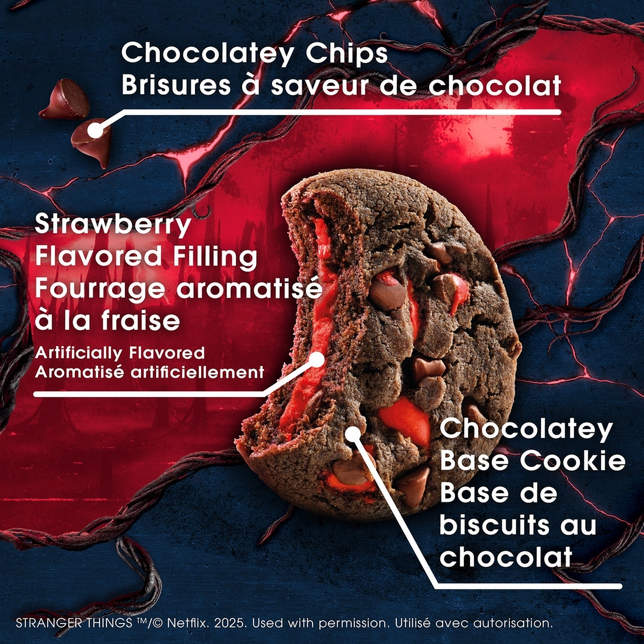Close-up of a cookie with strawberry filling and chocolate chips, labeled with ingredients.