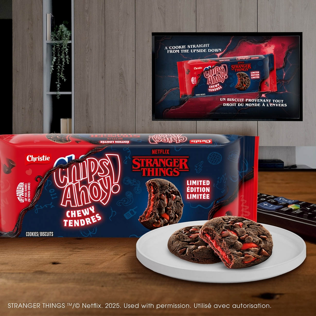 Chips Ahoy! cookies with Stranger Things branding on a table, with a TV screen displaying the same branding in the background.