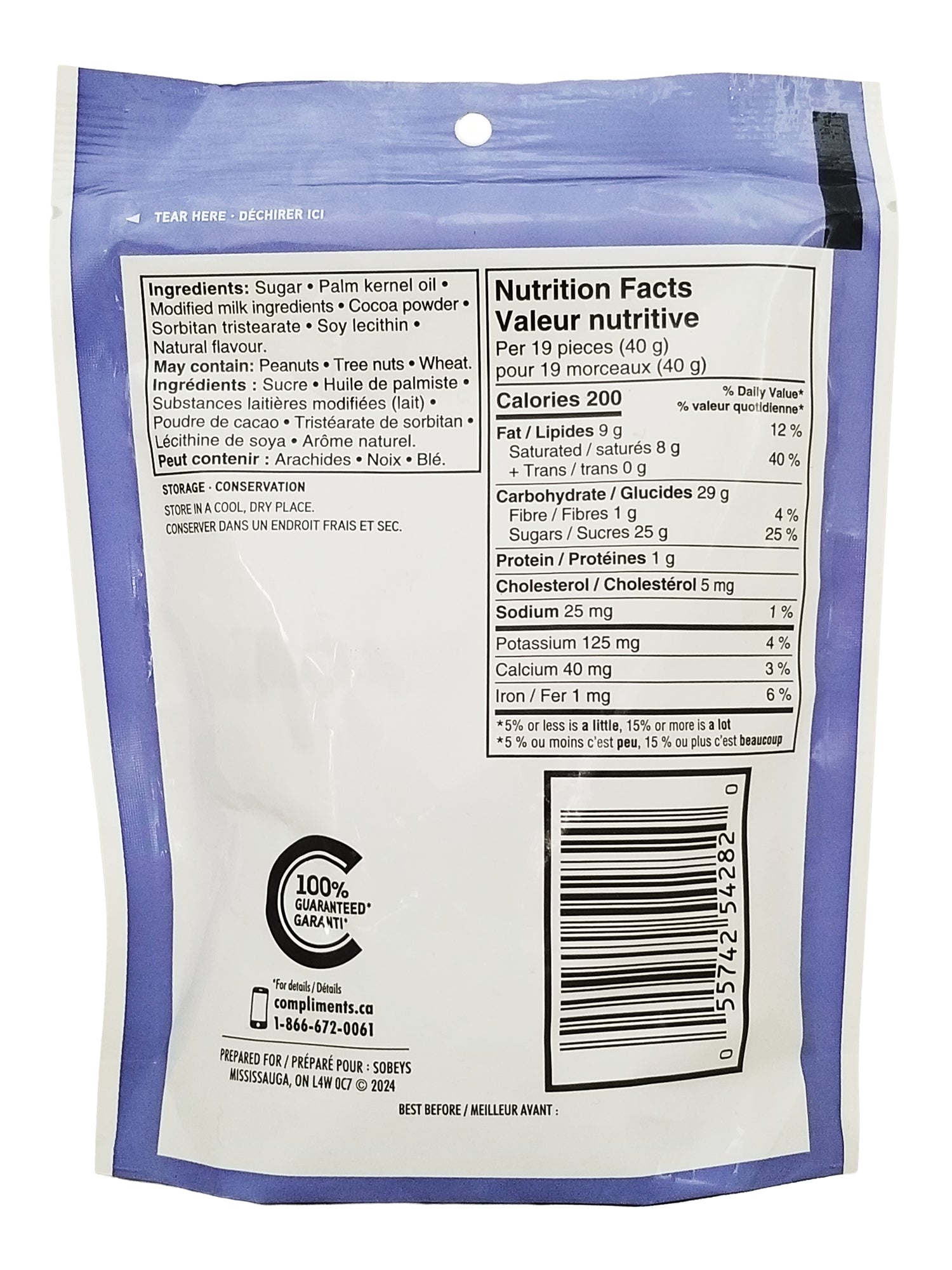 back view of a Compliments Choco Drops Candy 110g package with nutrition facts label and a blue border.