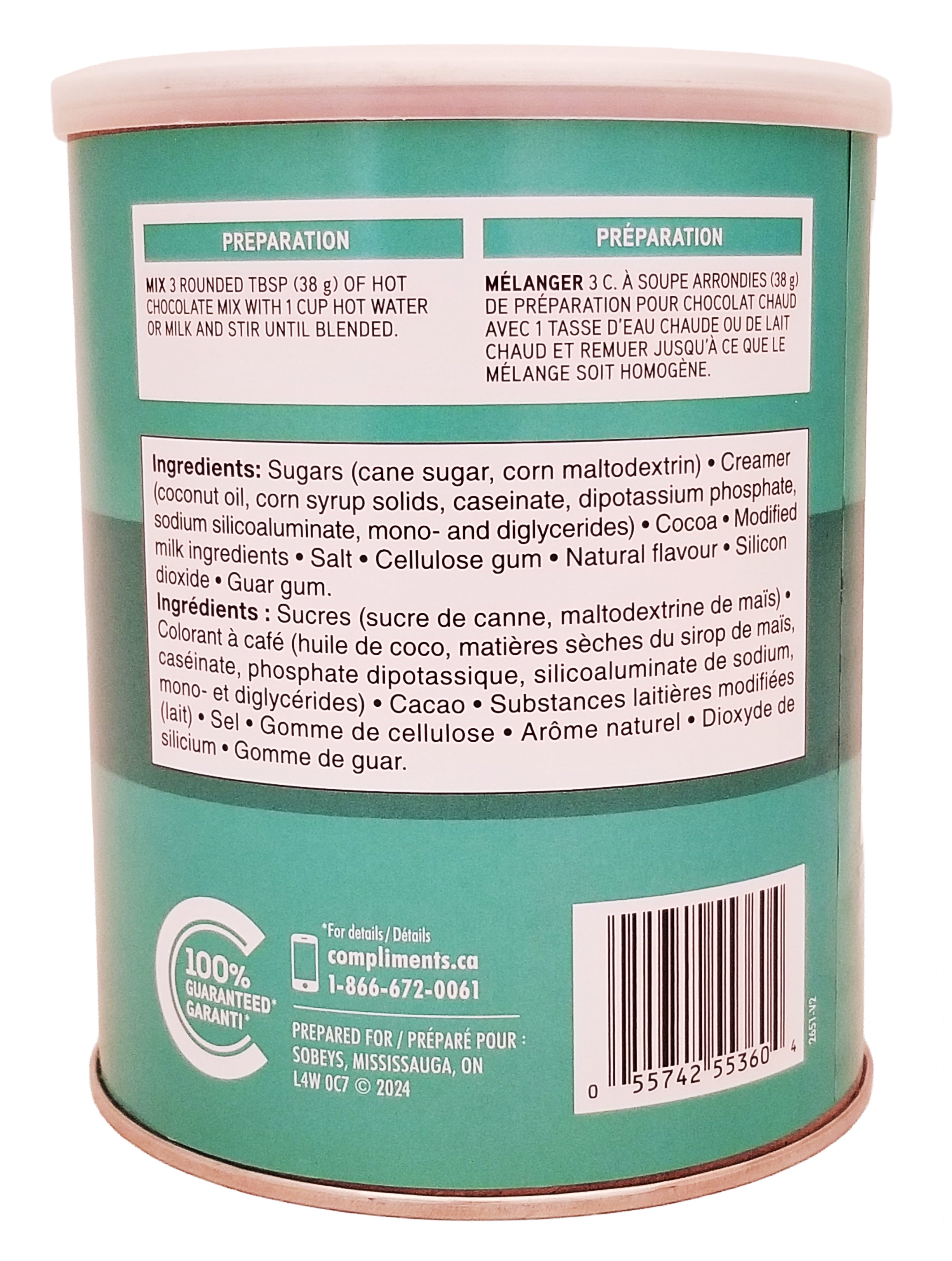 Back of a Compliments Mint Instant Hot Chocolate Mix - 500g green container with text and a barcode on a white background