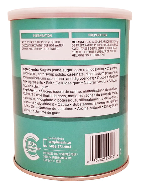 Back of a Compliments Mint Instant Hot Chocolate Mix - 500g green container with text and a barcode on a white background