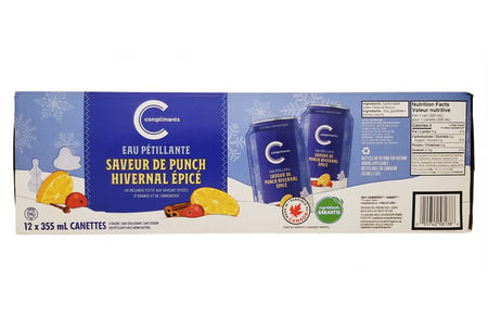 Packaging of Compliments sparkling winter punch with blue cans and festive design.