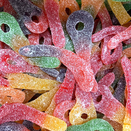 Bulk Cottage Country Sour Pleezers gummies in assorted fruit colors with sour sugar coating