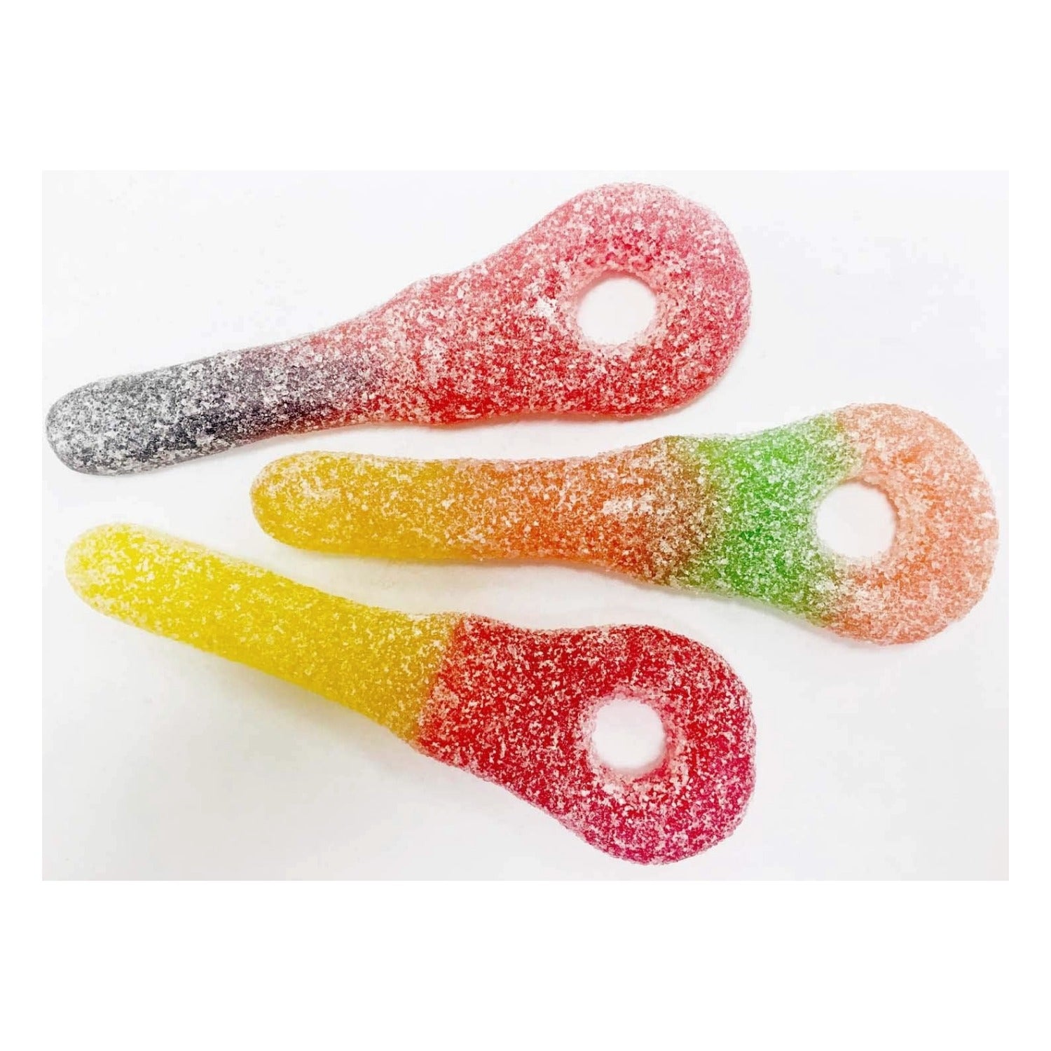 Close-up of three Cottage Country Sour Pleezers gummies in assorted colors with sour sugar coating