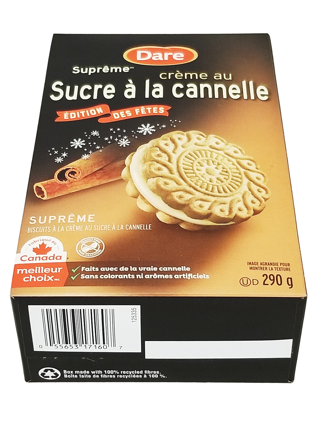 Box of Dare cinnamon cream cookies with a cinnamon stick on a white background