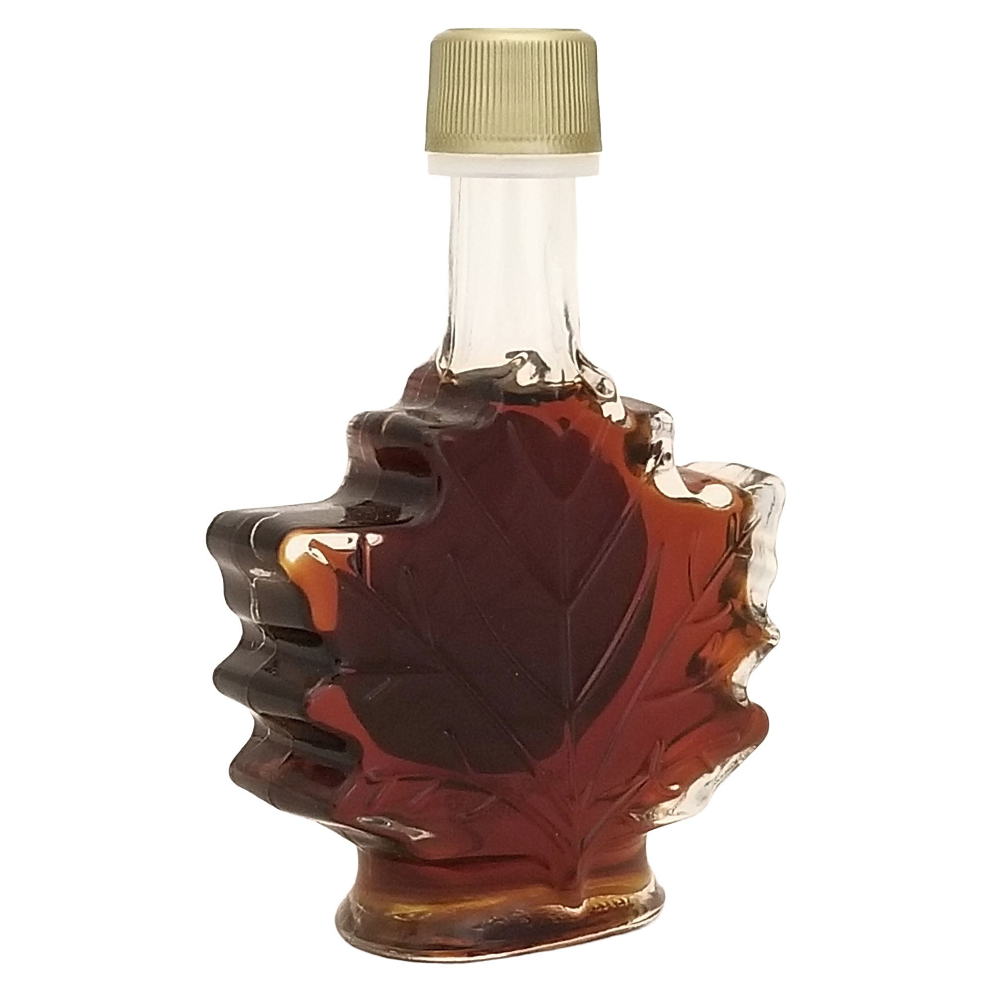 Angled back view of Erabl'Or maple syrup bottle showing the raised maple-leaf design in the glass.