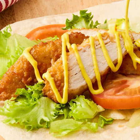 French's Dill Pickle Mustard Spread drizzled on grilled chicken