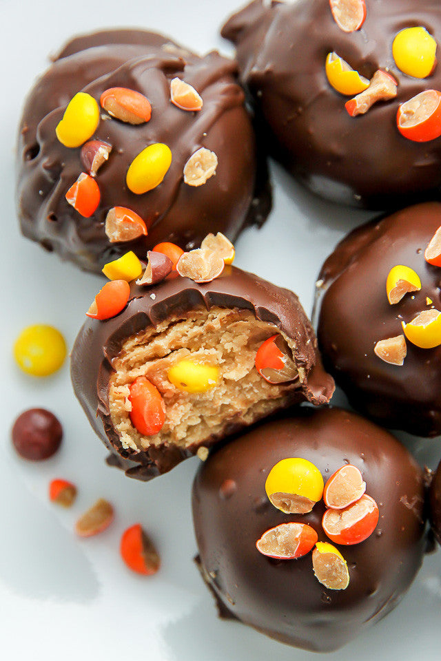 Peanut butter bites made with Reese Pieces Mini perfect for baking.