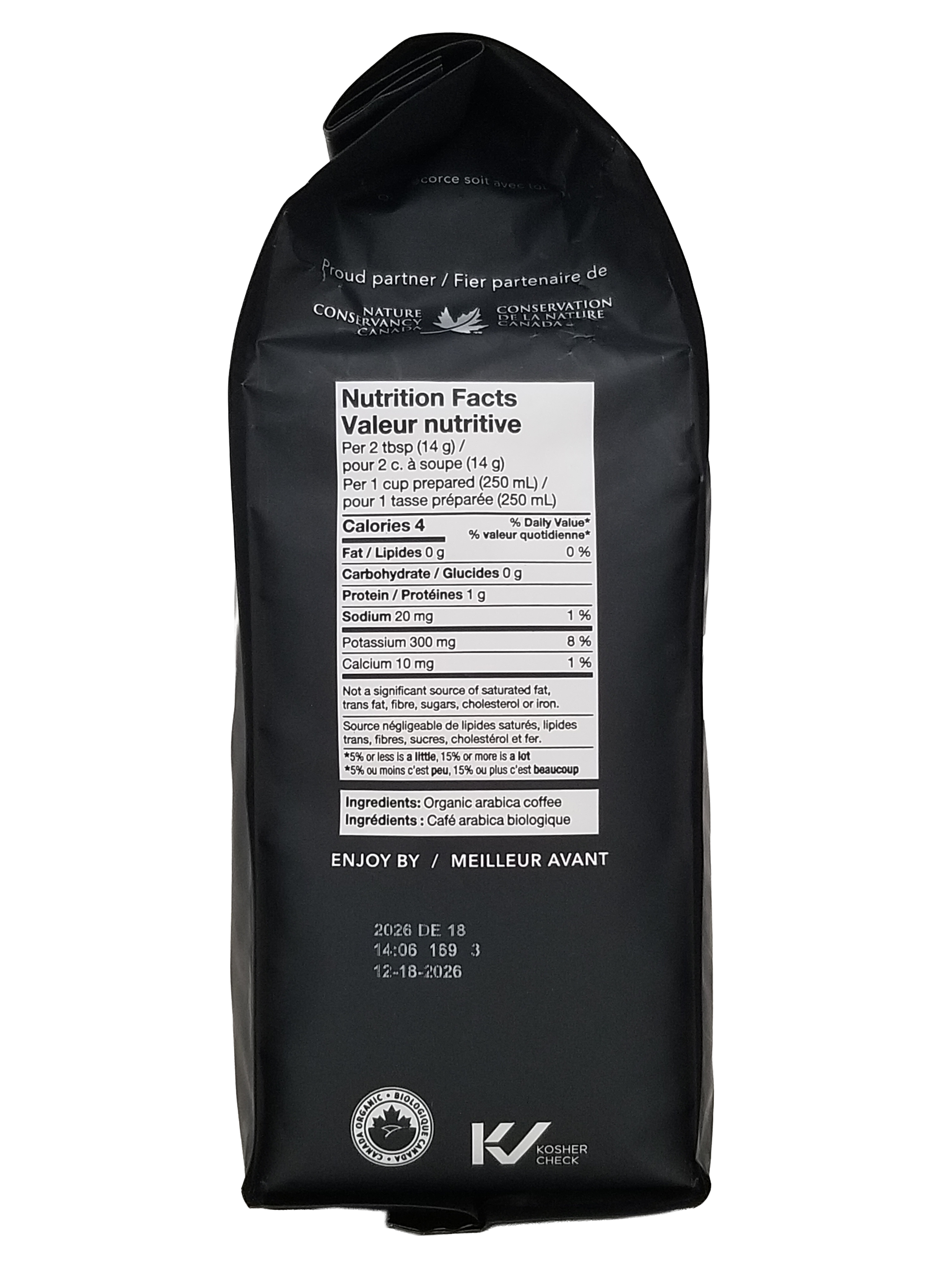 Black coffee bag of Kicking Horse Happy Camper Organic Ground Coffee, Essential, Spirited, Bold, 850g/30 oz with nutrition facts label on a white background