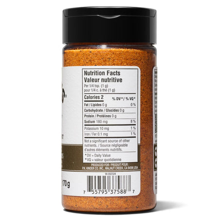 Kinder's Wood-Fired Garlic Seasoning 170 g jar side view showing UPC barcode, nutrition facts, and P.K. Kinder Co. producer info