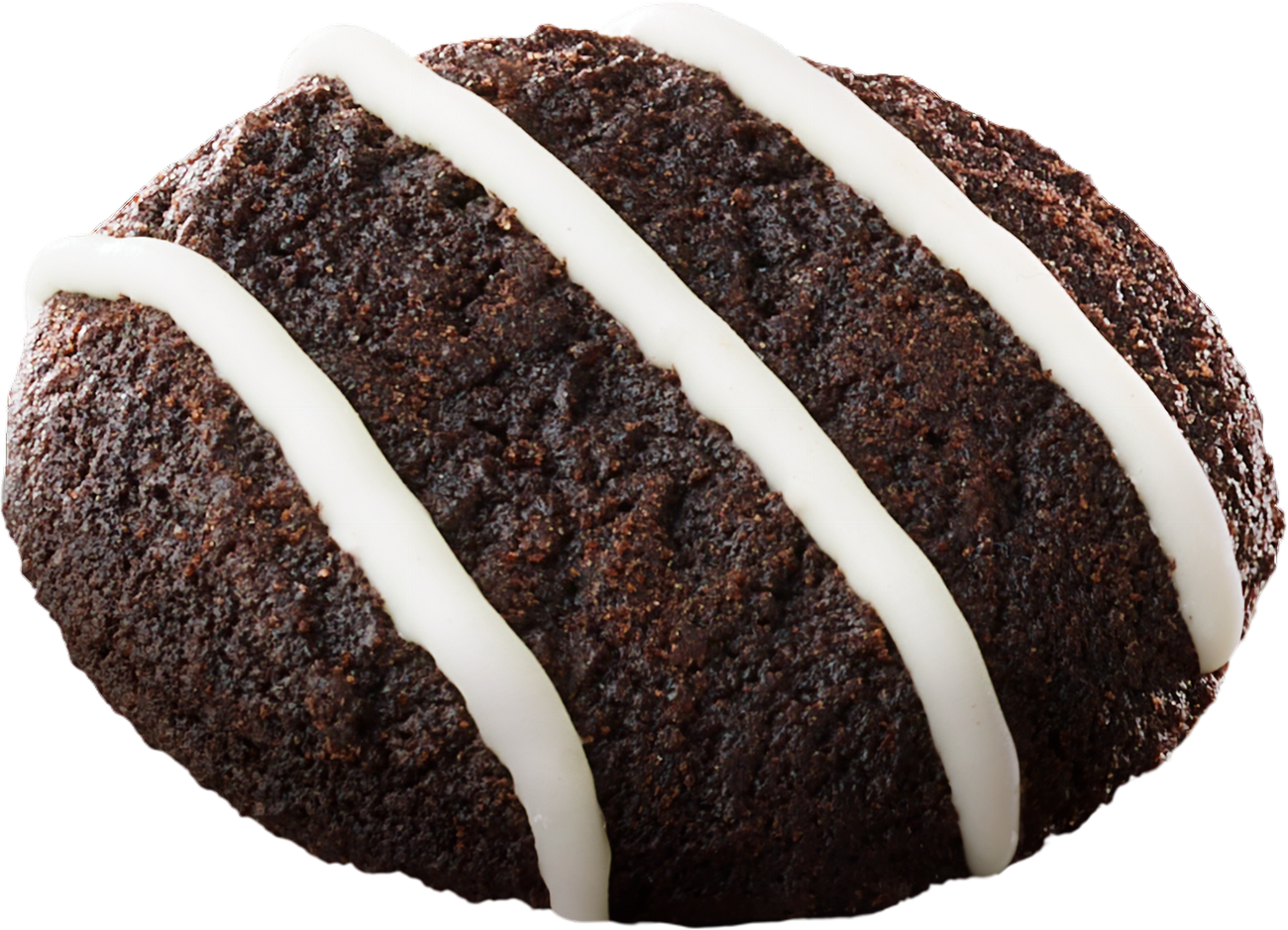 One Leclerc Celebration Cookies & Creme Mini Cookie with white icing on a white background