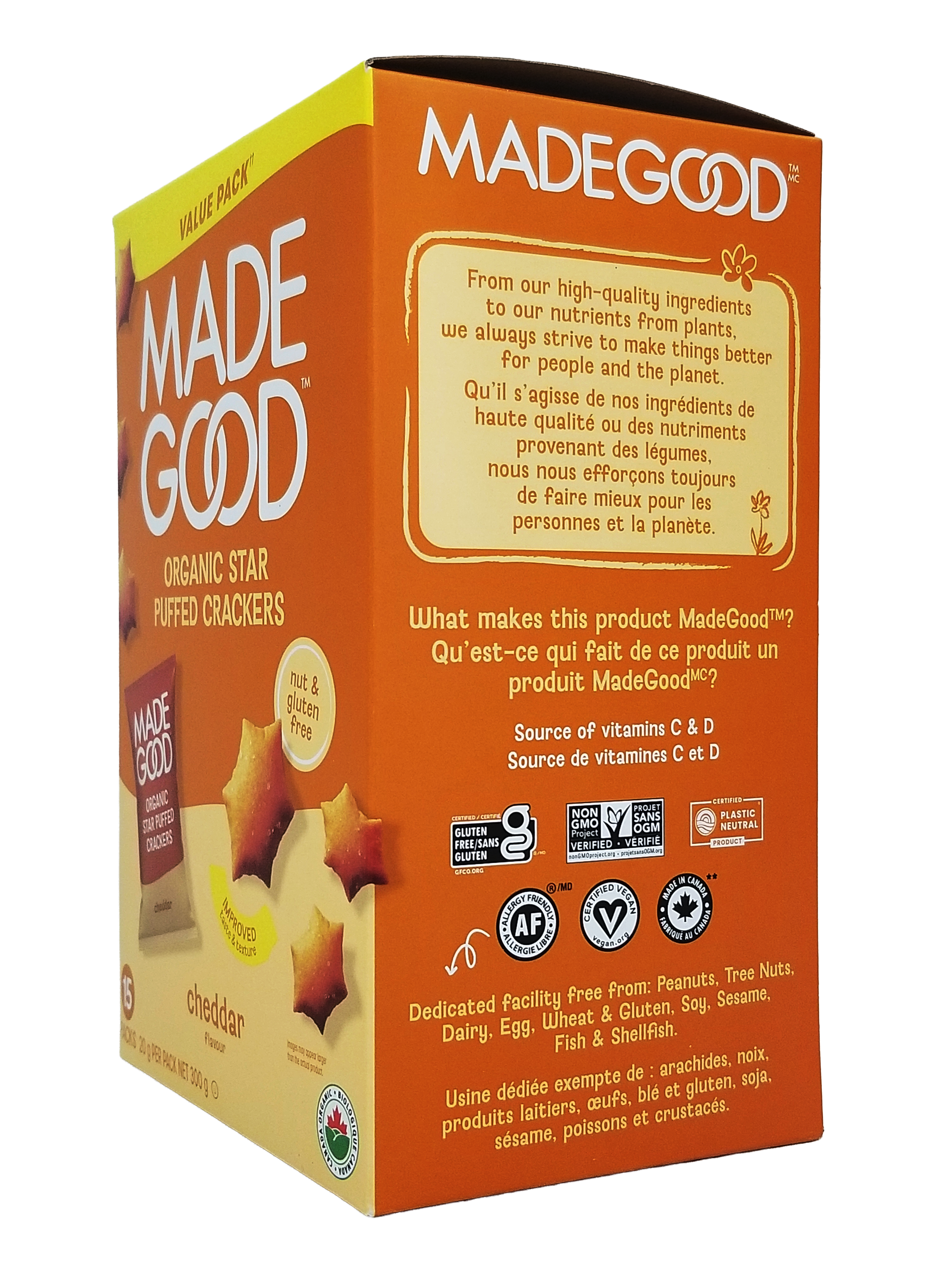 Box of Made Good Organic Star Puffed Crackers Cheddar Flavor, Value Pack 15 Snack Packs - 300g/10.5 oz with branding and product details on an orange background