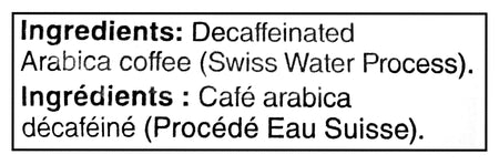 Ingredients label for McCafe Medium Dark Decaf Ground Coffee 340g, indicating decaffeinated Arabica coffee with Swiss Water Process on a black background