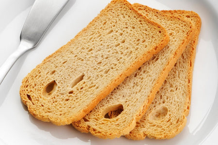 Boulangerie Grissol Melba Toast, Sesame, 200g, sesame toast on a plate.