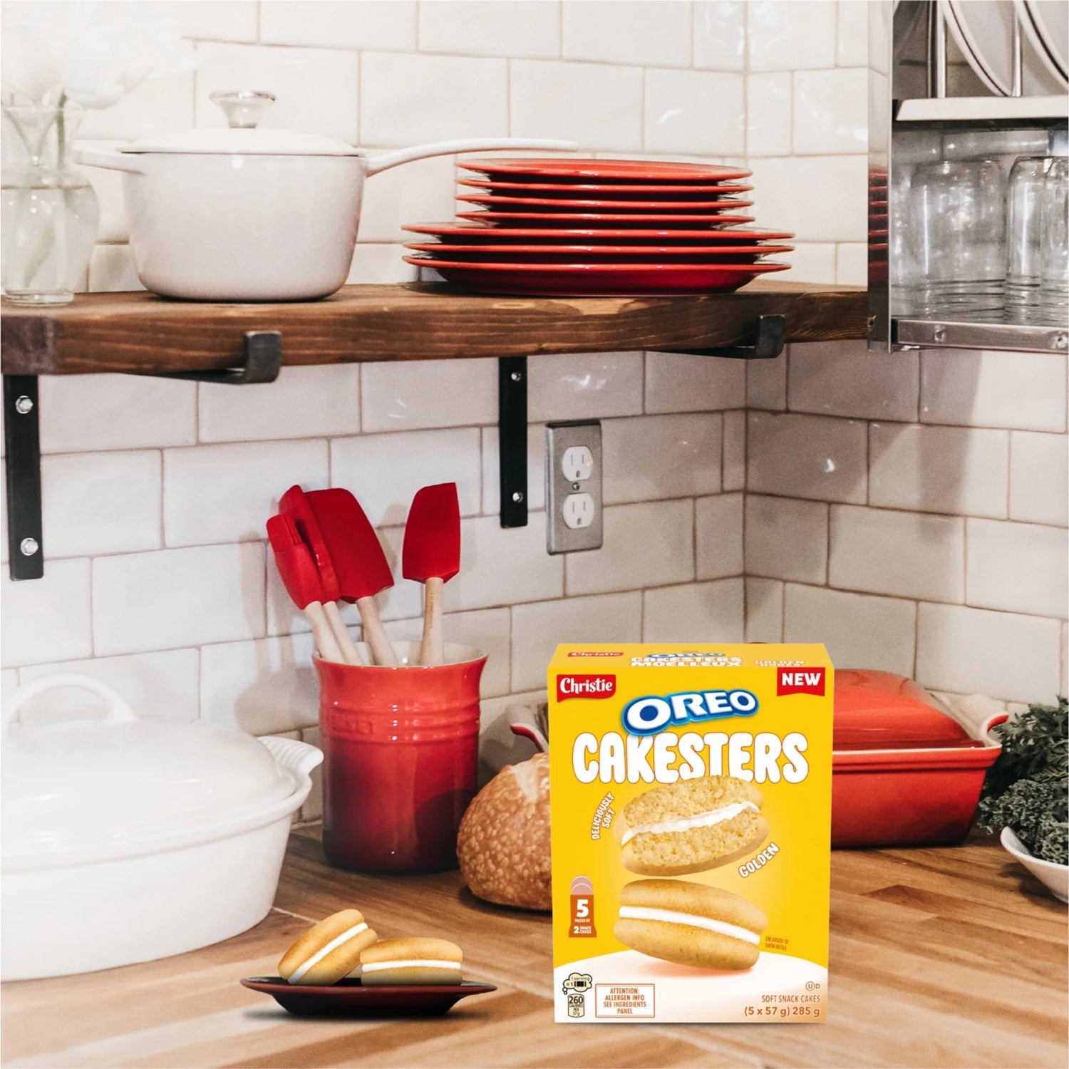 Box of Oreo Cakesters on a kitchen counter with baking tools and ingredients.