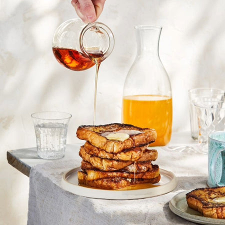 Our Finest Very Dark Maple Syrup drizzled over French toast — pure Canadian maple syrup