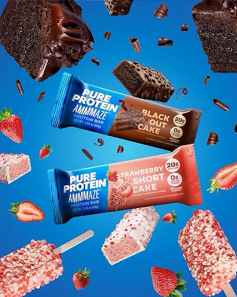 Pure Protein Ammame bars in strawberry short cake and black out cake flavors on a blue background with cake pieces and strawberries.