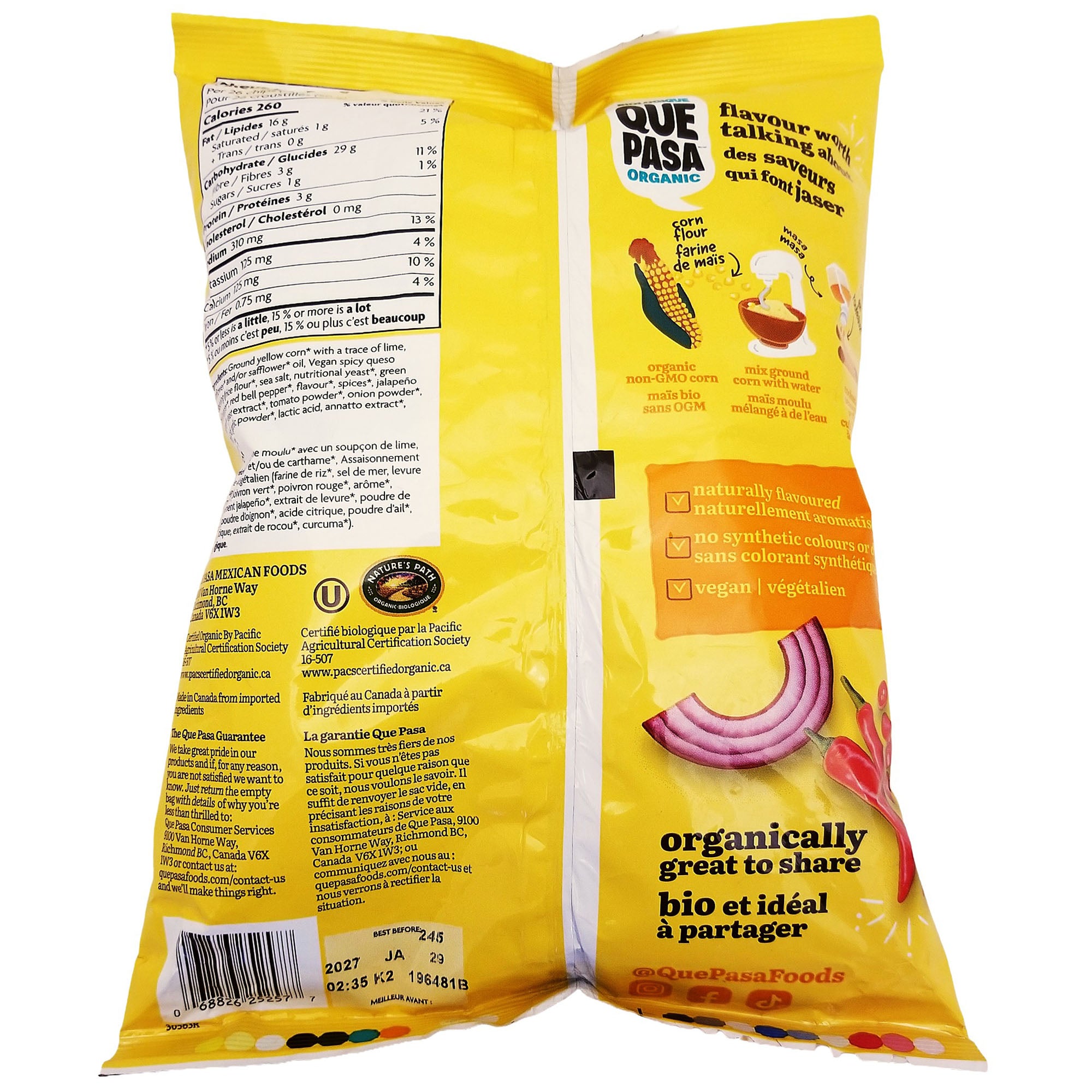Angled back view of Que Pasa Organic Spicy Queso chip bag showing the barcode and best-before marking.