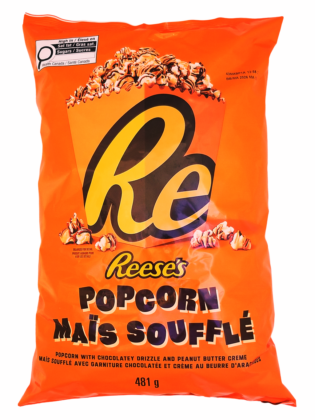 Reese's Popcorn packaging with orange background and Reese's logo
