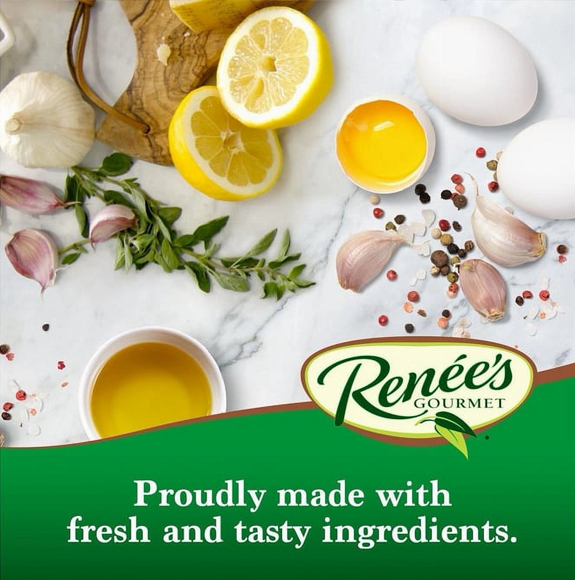 Ingredients including lemons, garlic, and herbs on a marble surface with Renée's Gourmet logo.