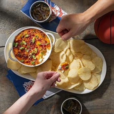 Ruffles Cool Ranch ridged potato chips in a game-night snack setting