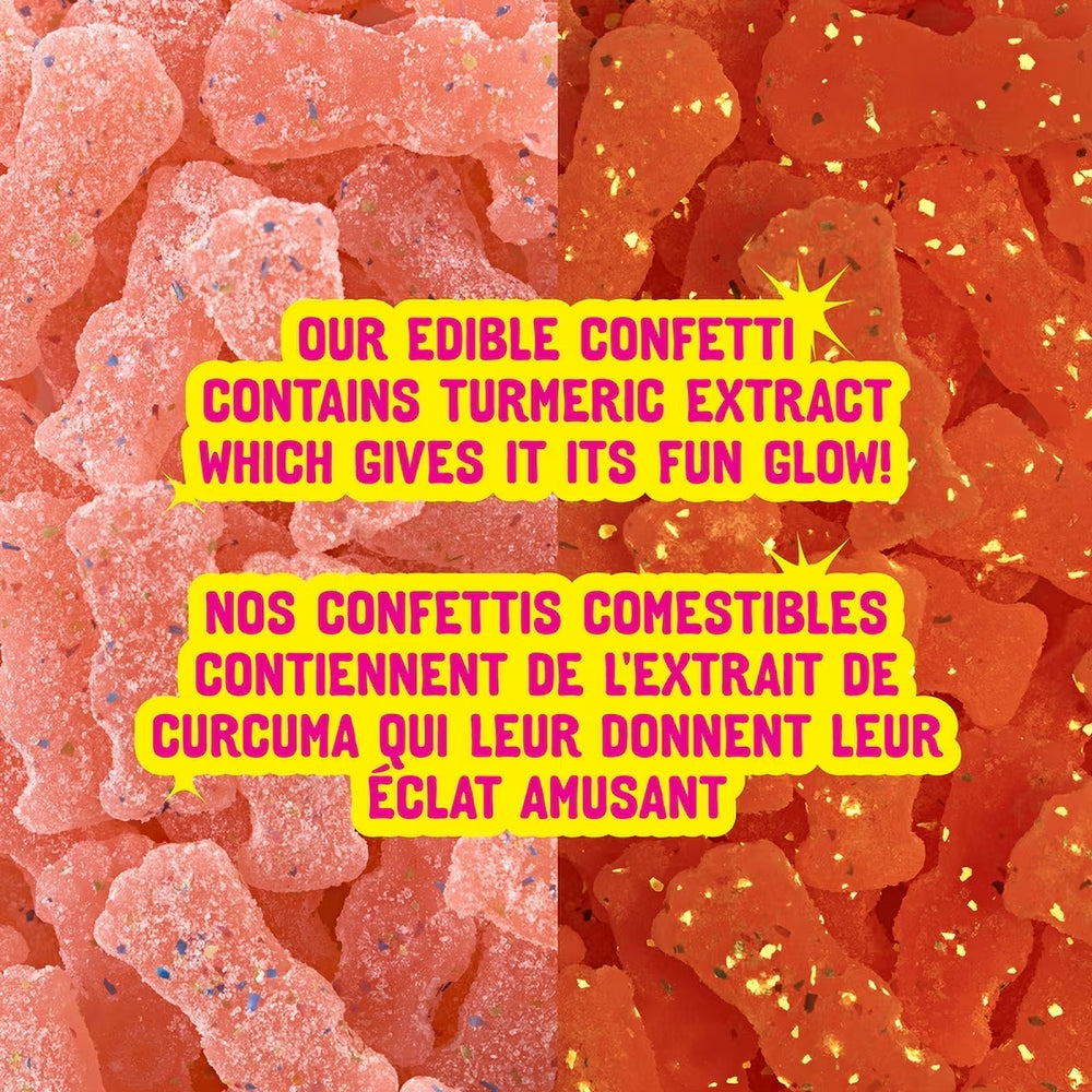 Edible confetti with turmeric extract on a pink and orange background
