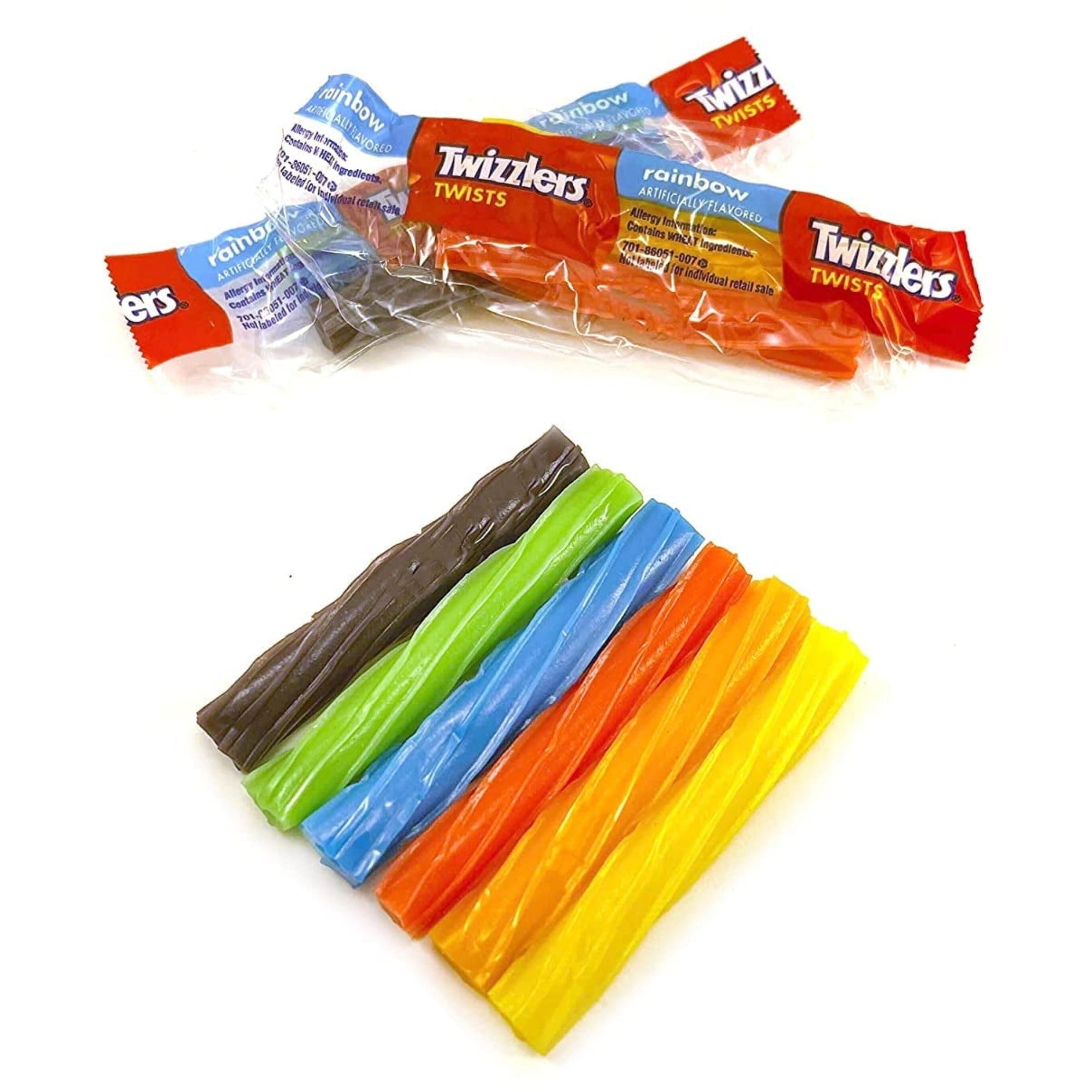 Multicolored Twizzlers rainbow Twists lined up beneath individual wrappers on a white background.