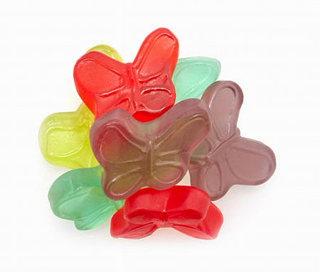 Colorful butterfly-shaped gummy candies on a white background