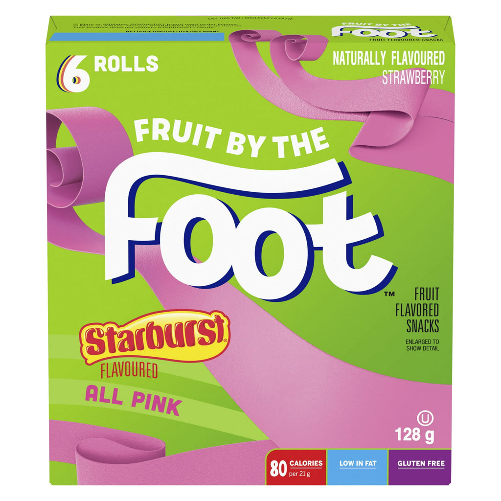 Box of Starburst Fruit by the Foot snacks with pink fruit rolls on a green background
