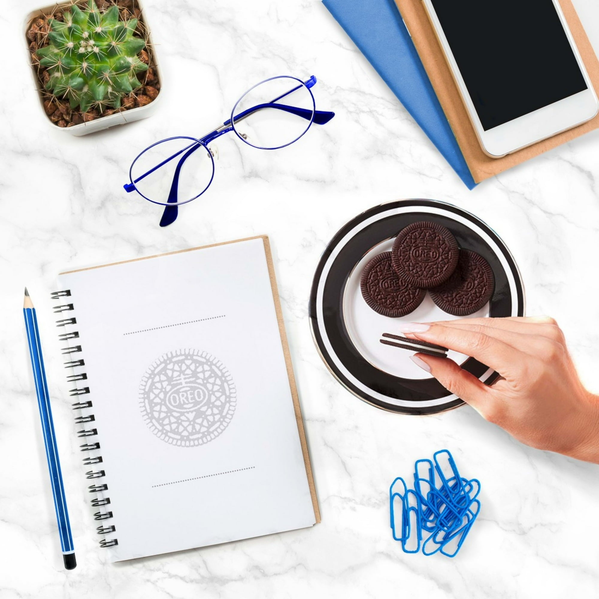 Oreo Thins Chocolate Sandwich Cookies enjoyed while studying.