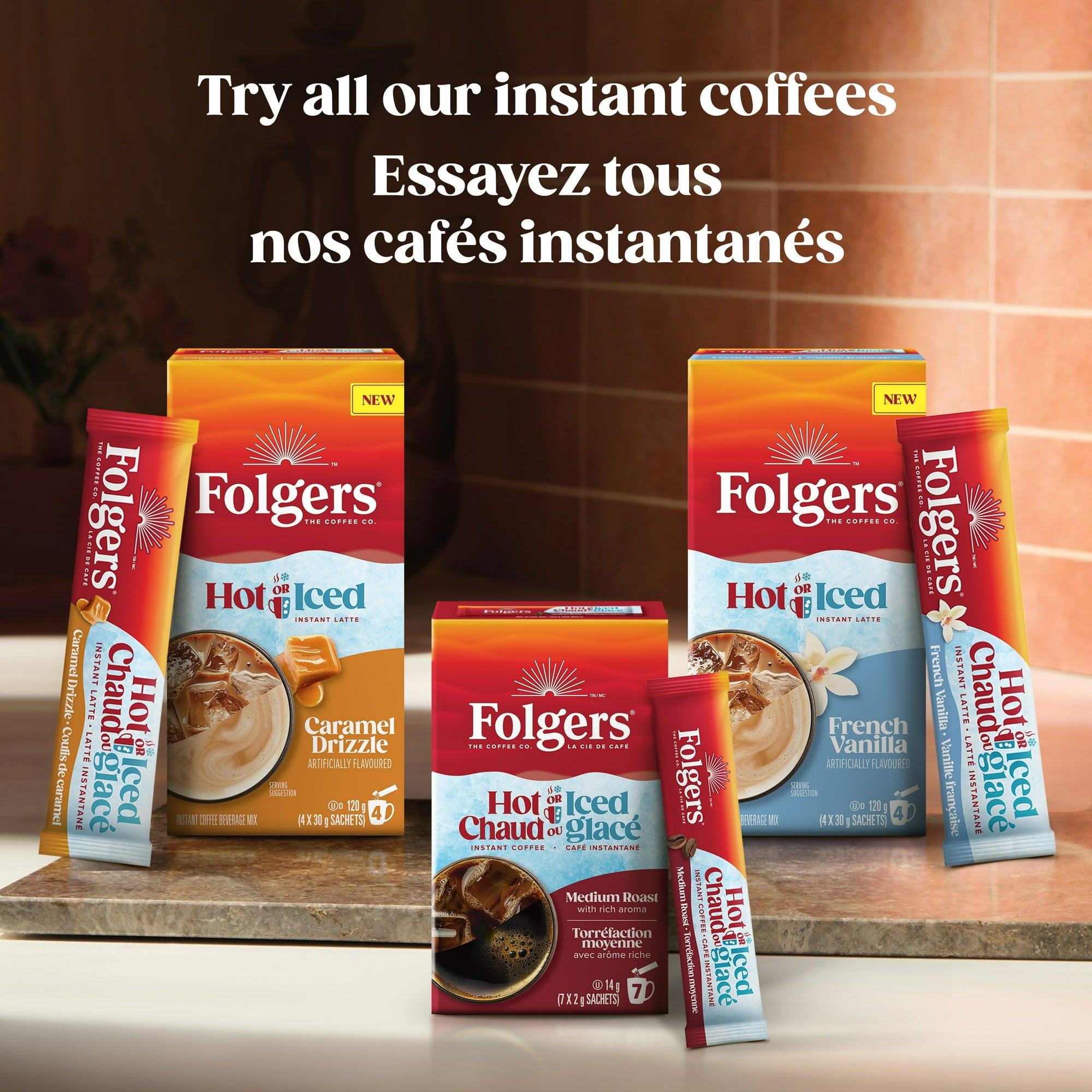 Folgers instant coffee packages on a wooden surface with a warm background.