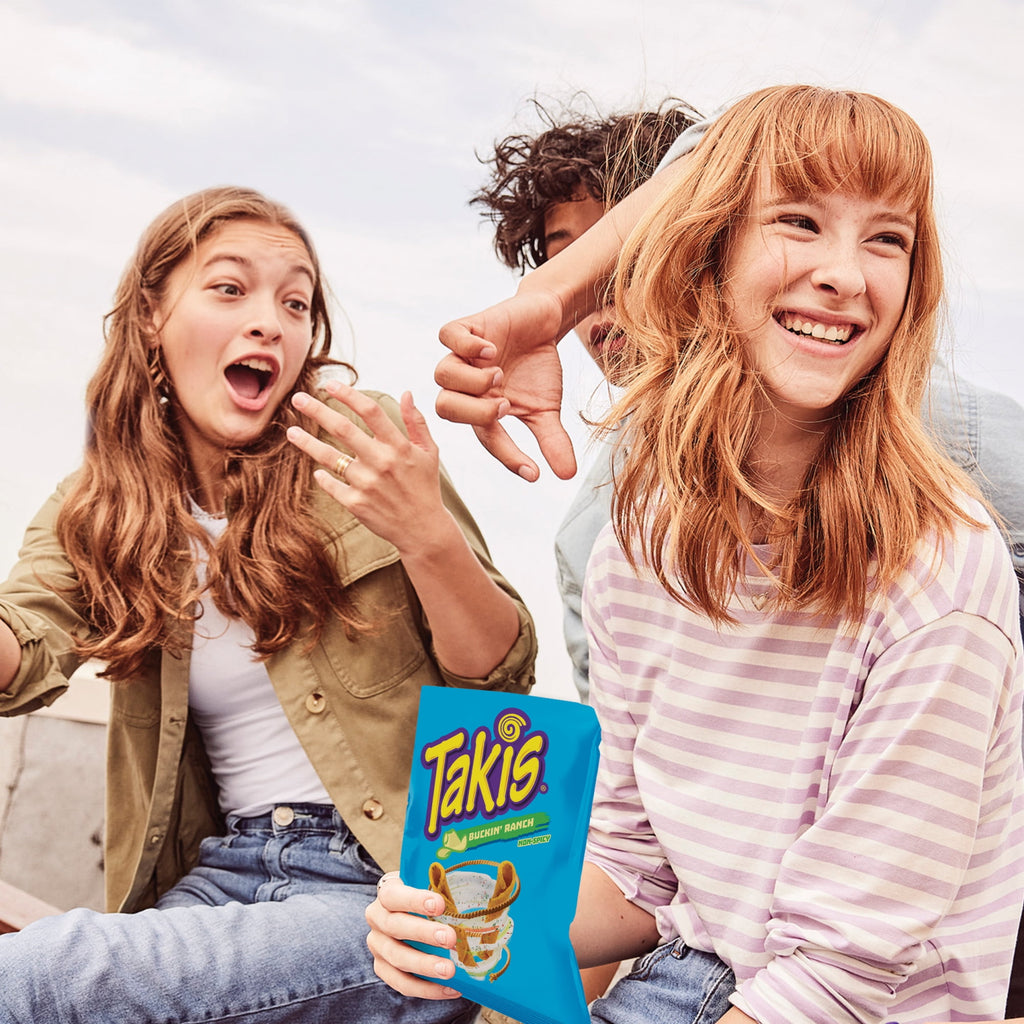 Takis Buckin' Ranch Non-Spicy Rolled Tortilla Chips enjoyed by teens