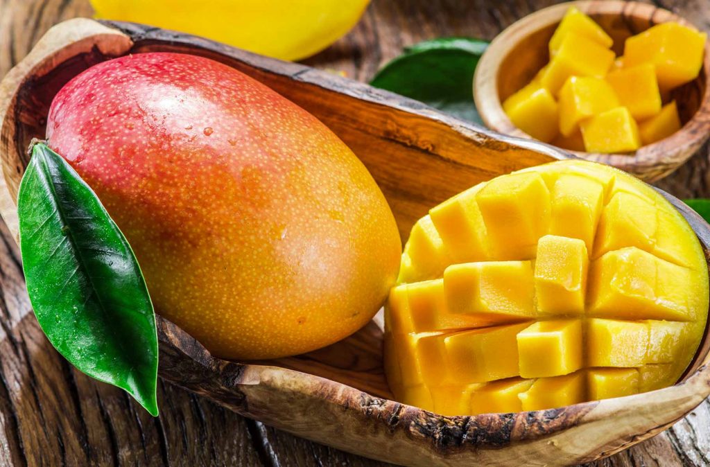 https://www.natural-cure.org/wp-content/uploads/diet-and-nutrition-Mango-The-King-of-Fruit-has-Incredible-Health-Benefits-1024x674.jpgpicture of mangos in a bowl.