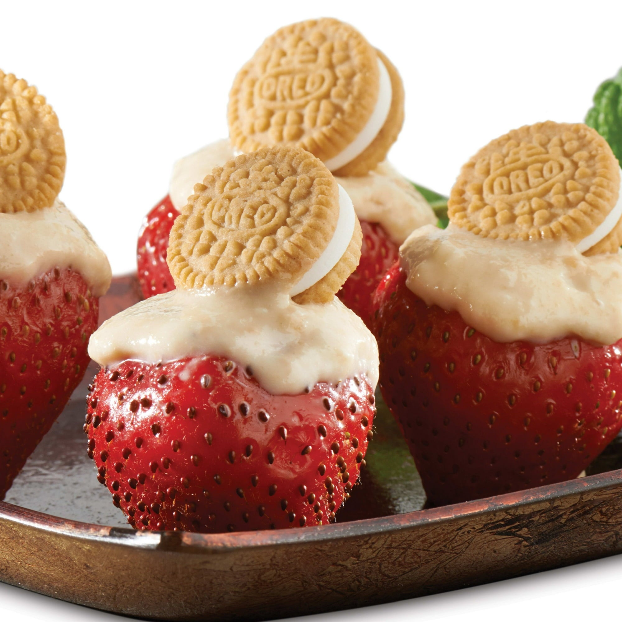 Oreo Golden Mini Dores, Sandwich Cookies on strawberry bites.