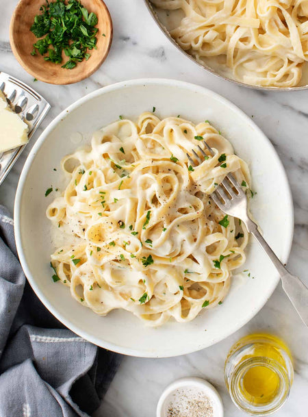 Club House Pasta Alfredo in a bowl.
