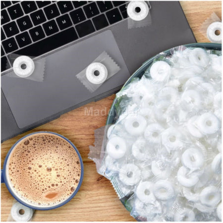 Life Savers Mints Pep-O-Mint Candy on a wooden surface with a laptop and coffee cup.